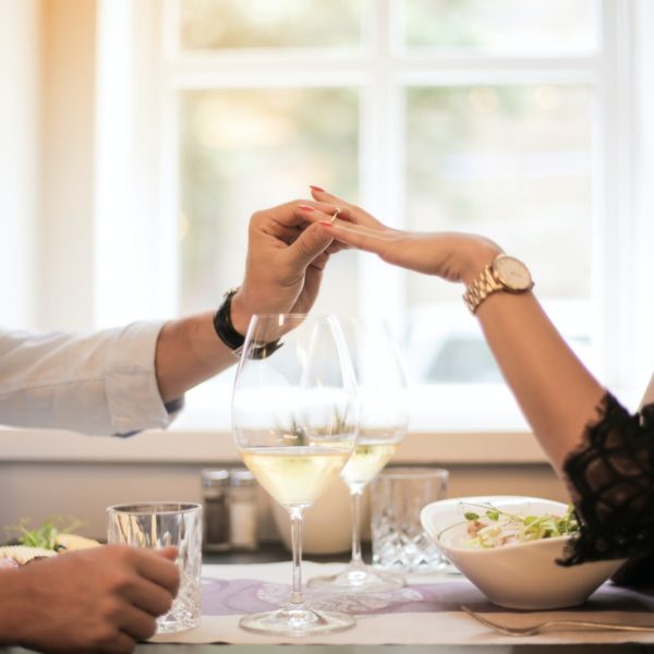 A lady receiving a ring with Argyle pink diamonds from her dear husband